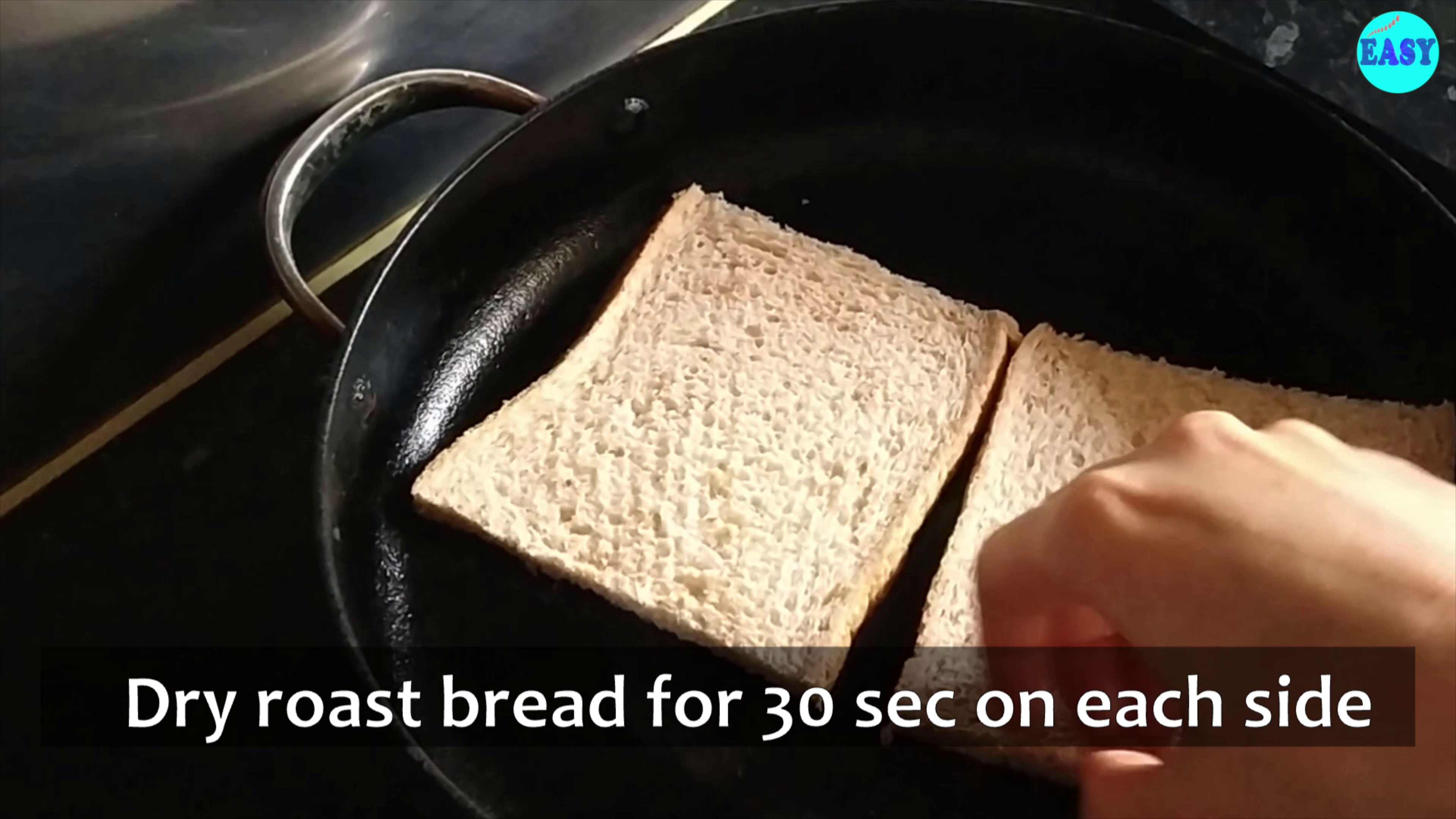 Step 1 - Heat a pan or tawa and lightly dry roast bread slice for 30 seconds on each side at low to medium flame.