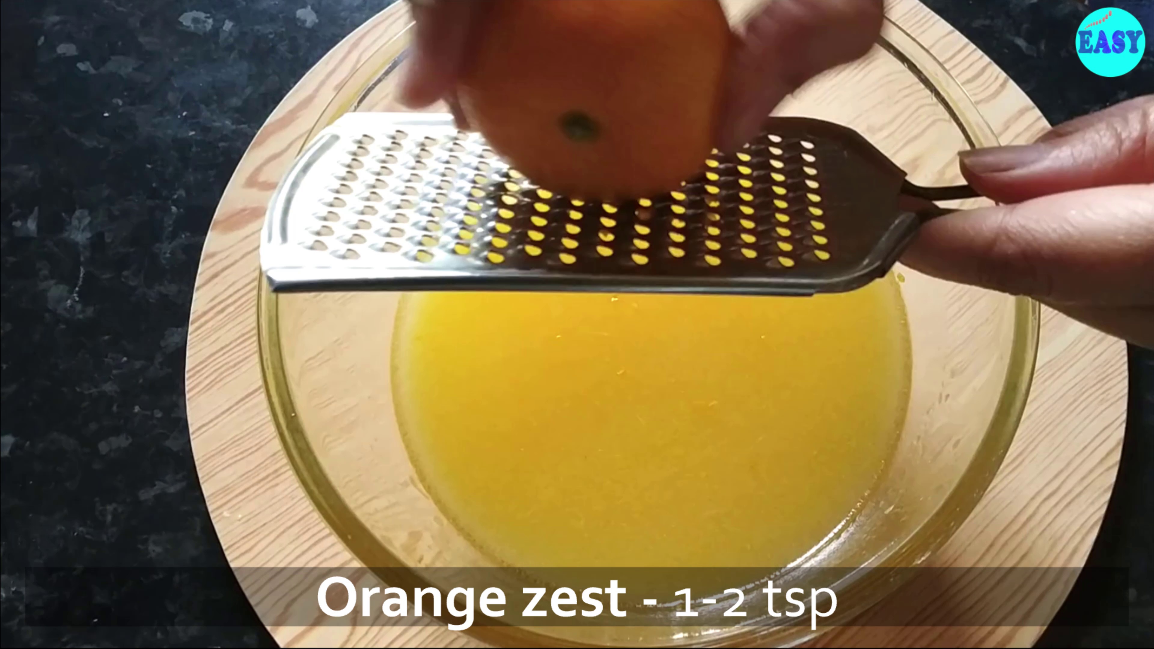 Step 2 - Now add orange zest and orange extract if using.