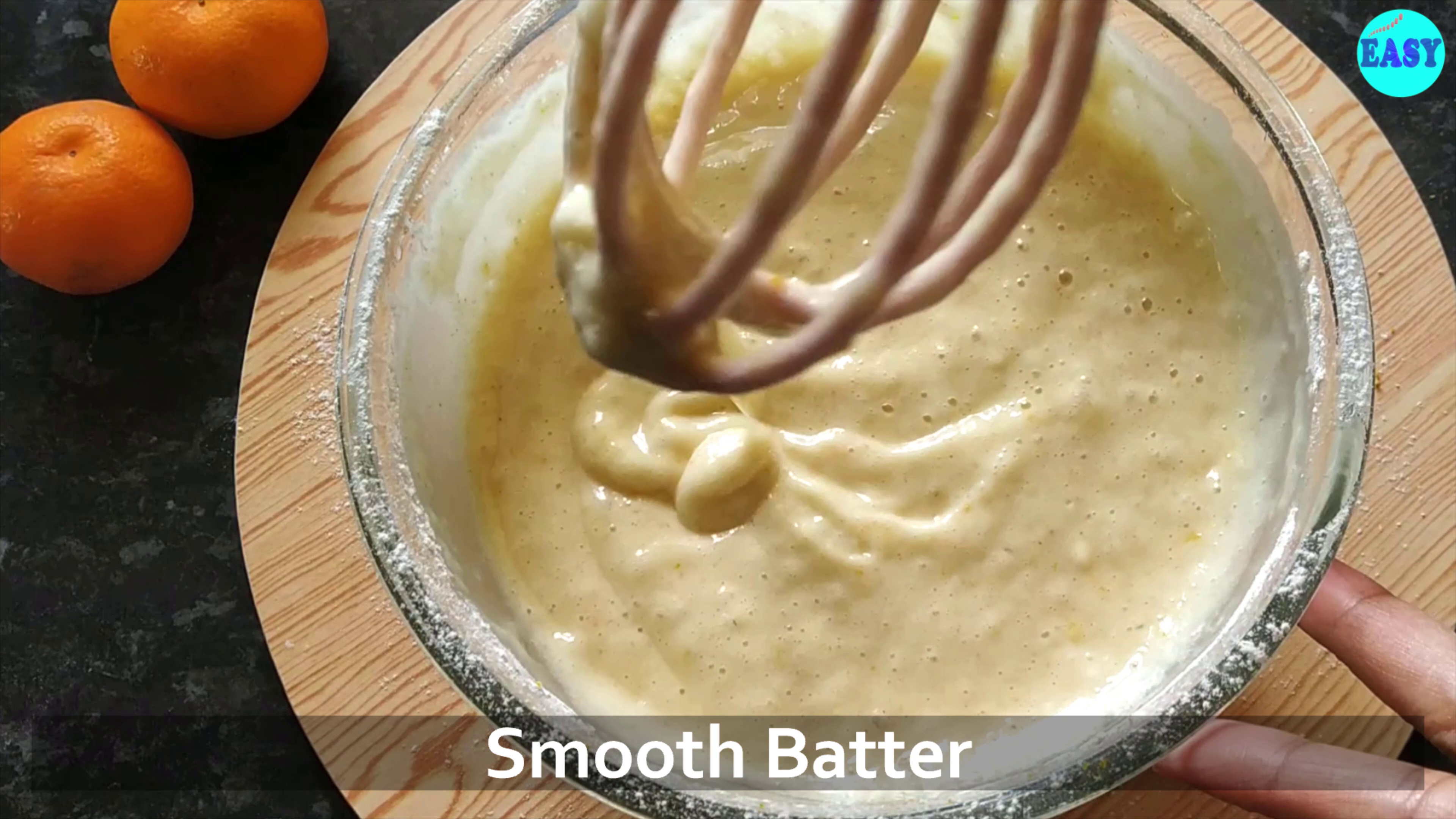 Step 5 - Make a smooth batter by adding all the dry ingredients to the wet mixture in batches.