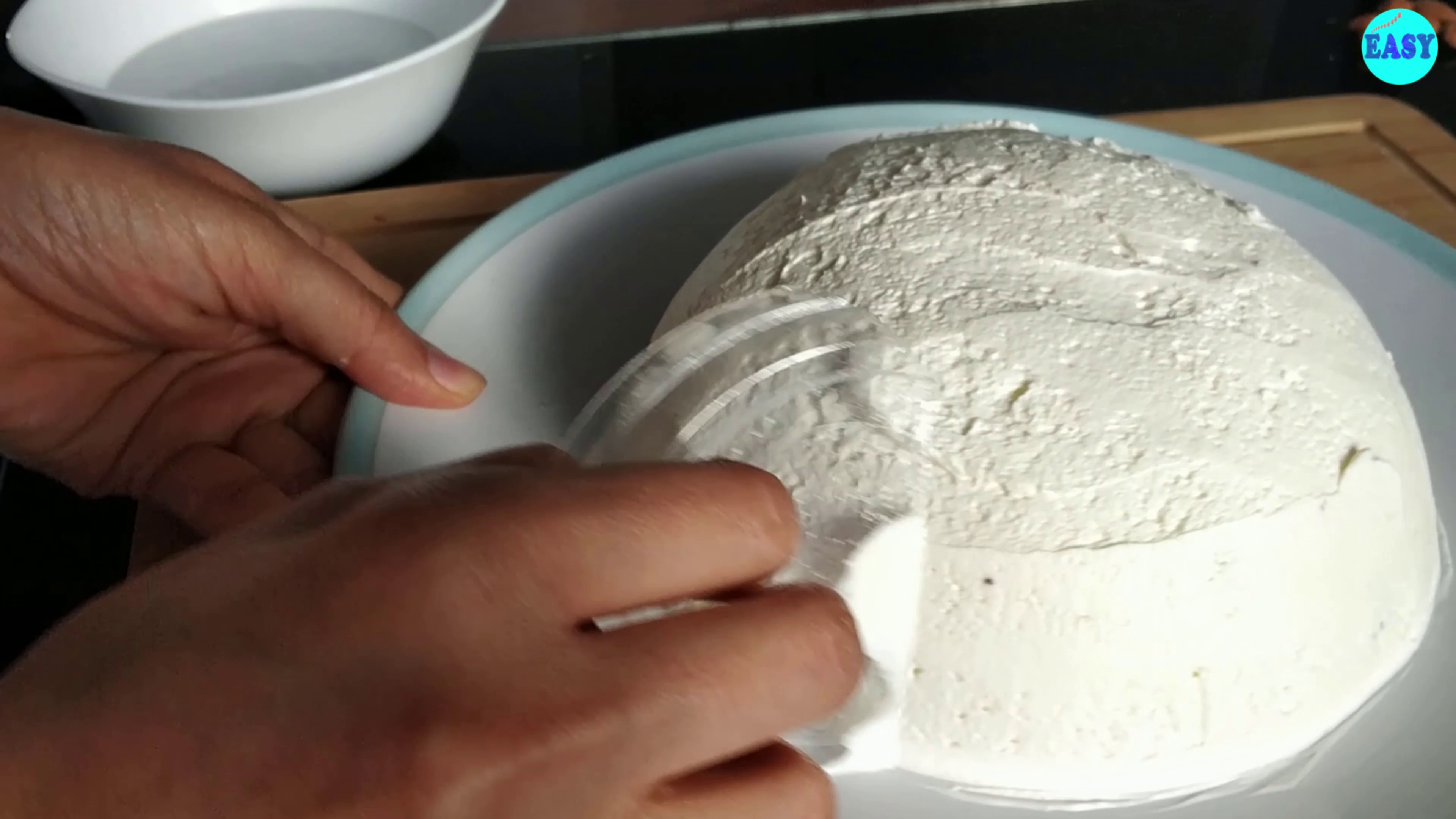 Step 13 - Cover all sides of the cake with whipped cream and smooth it with help of cake smoother.