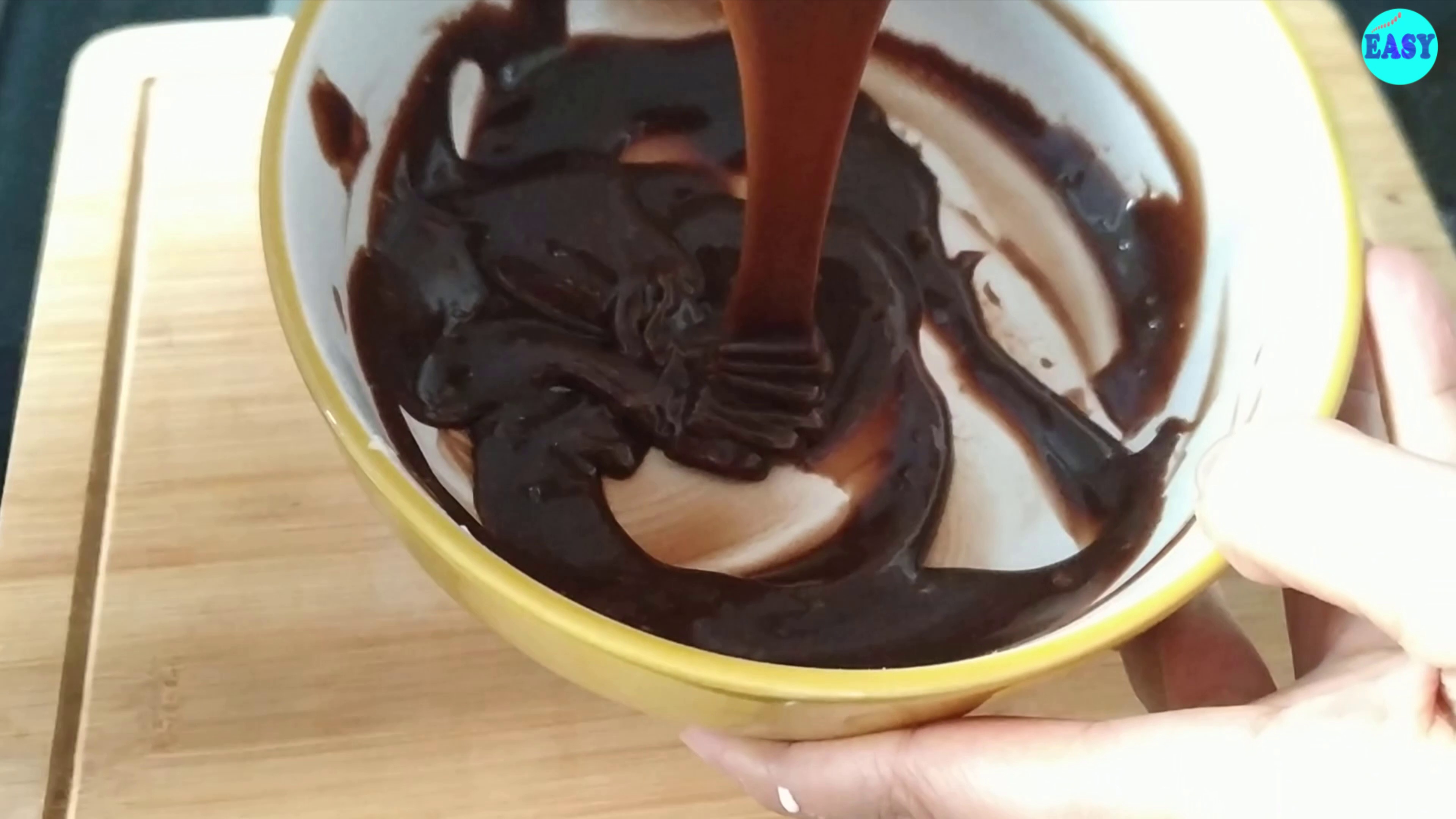 Step 17 - Let the ganache come cool a bit before you pour it on the cake.