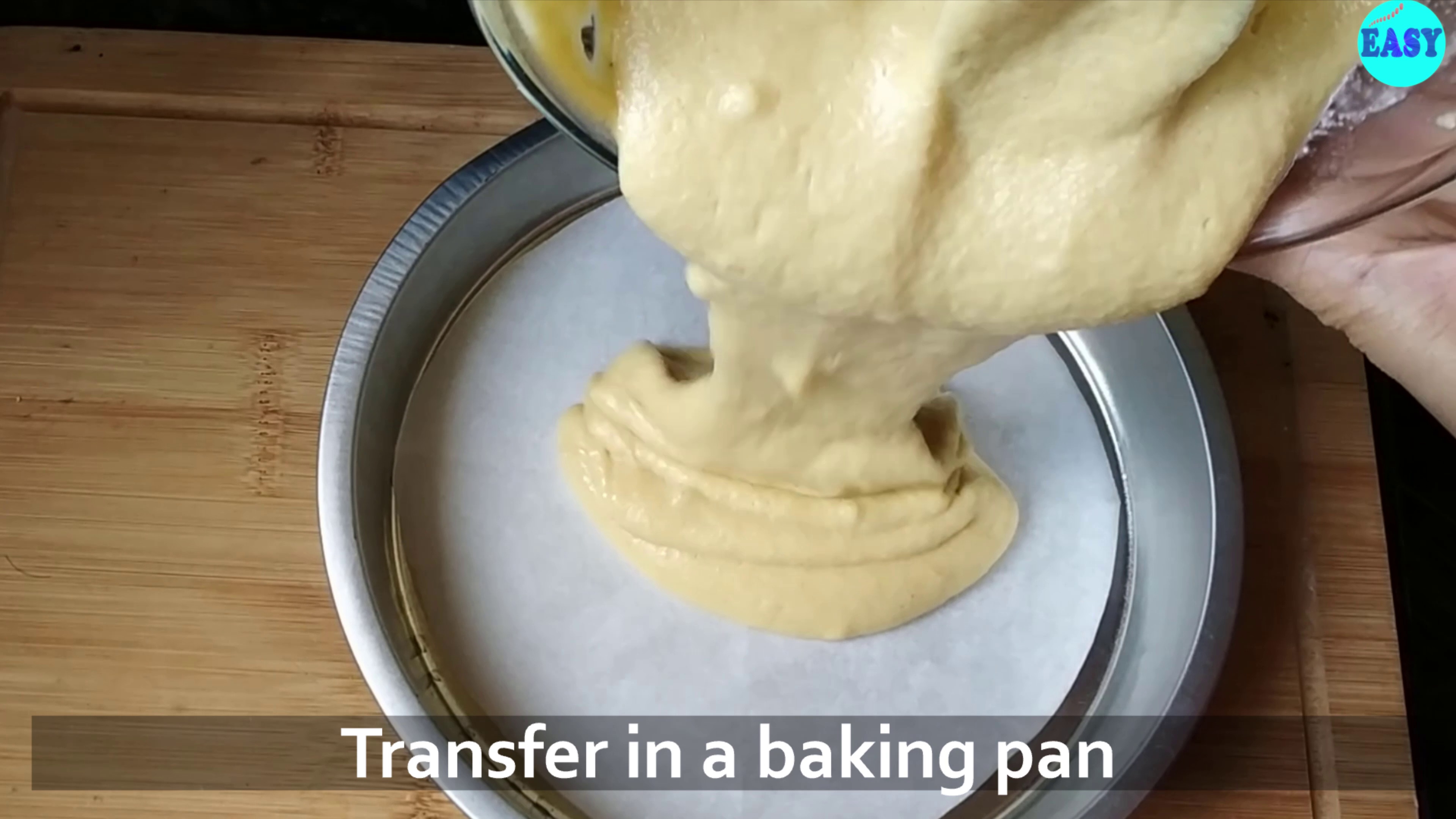 Step 7 - Transfer the mixture into a greased and lined baking tin.