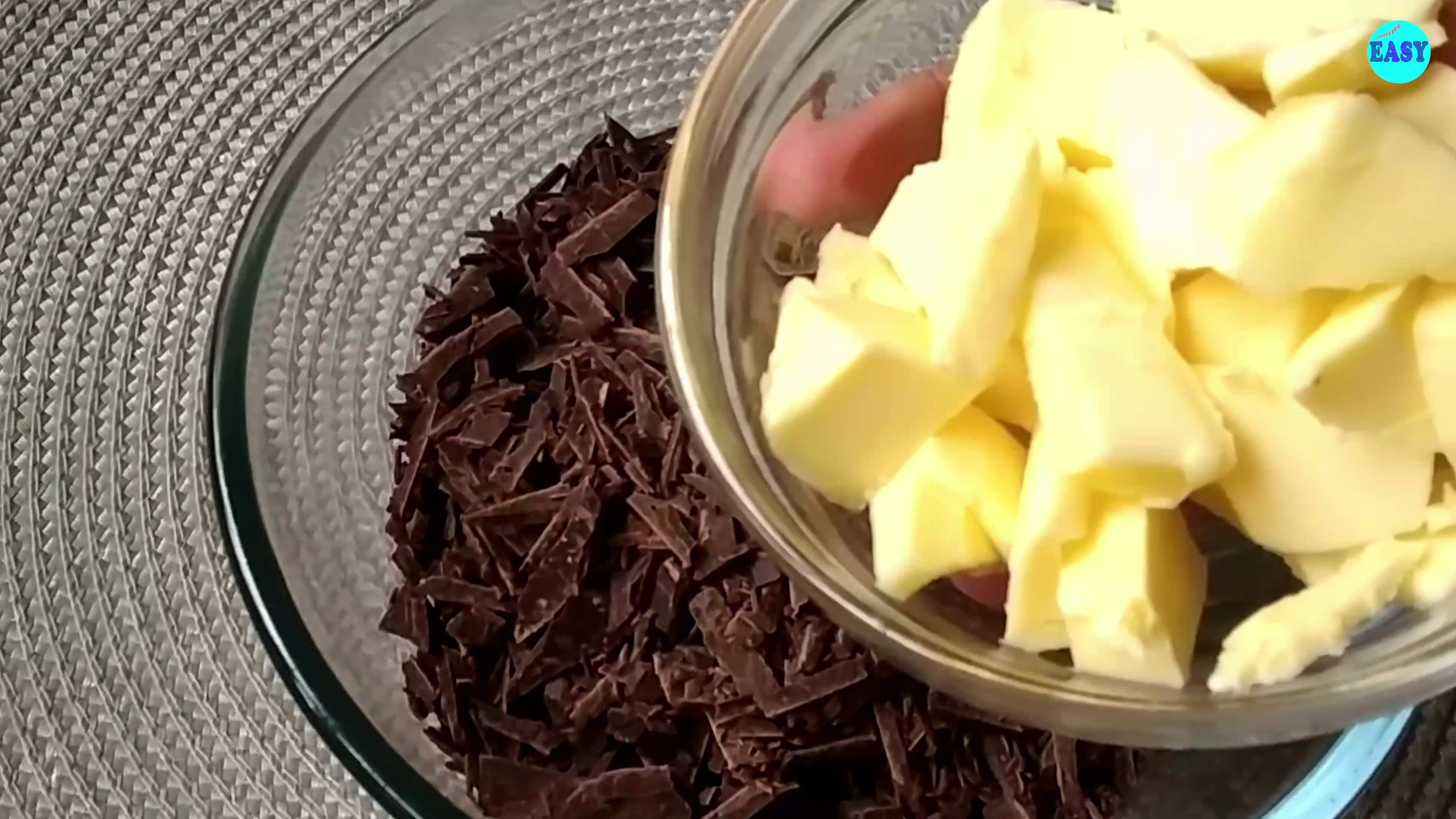 Step 2 - Transfer the chopped chocolate into a heatproof  bowl and add butter to it.