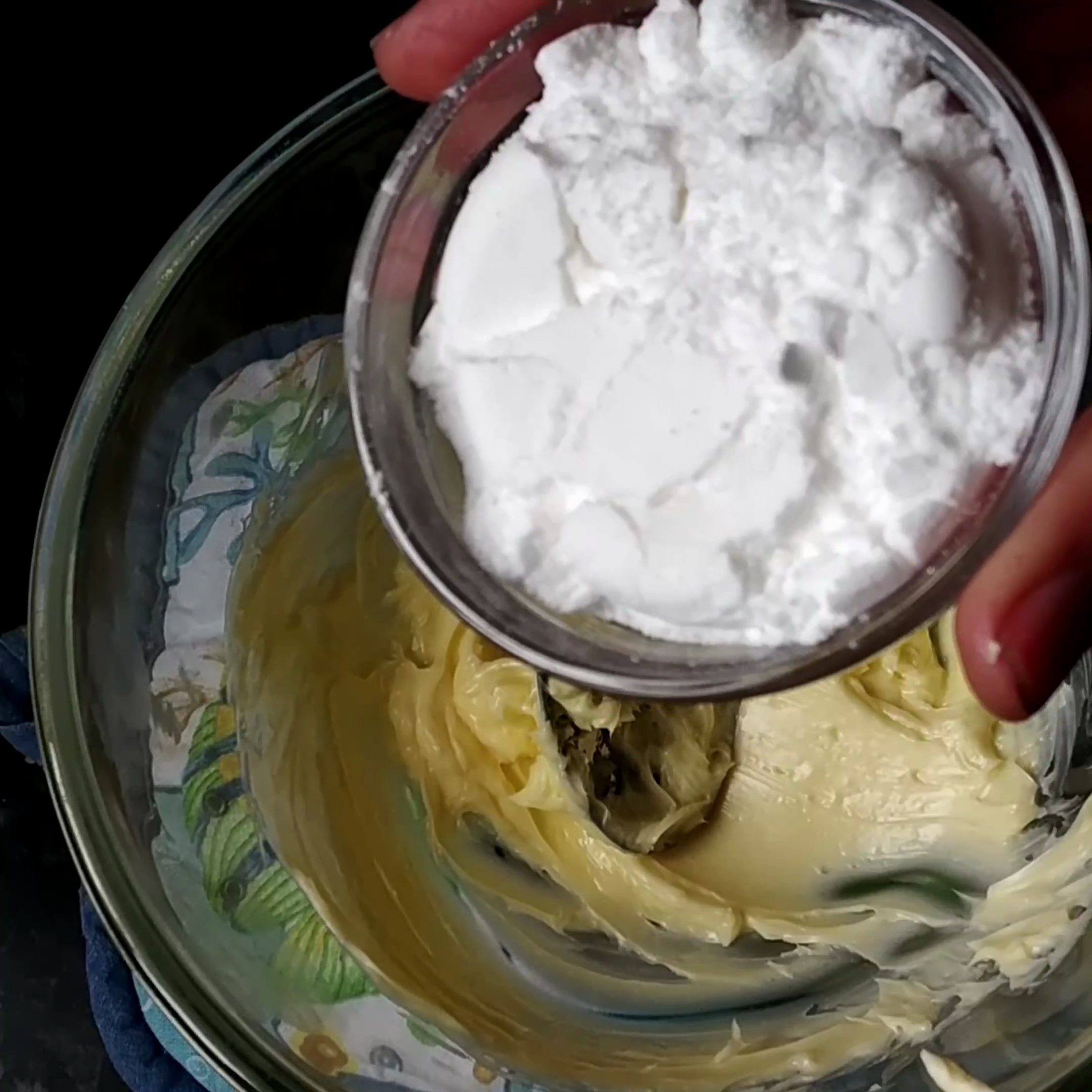Step 1 - In a mixing bowl cream together butter and powdered sugar.