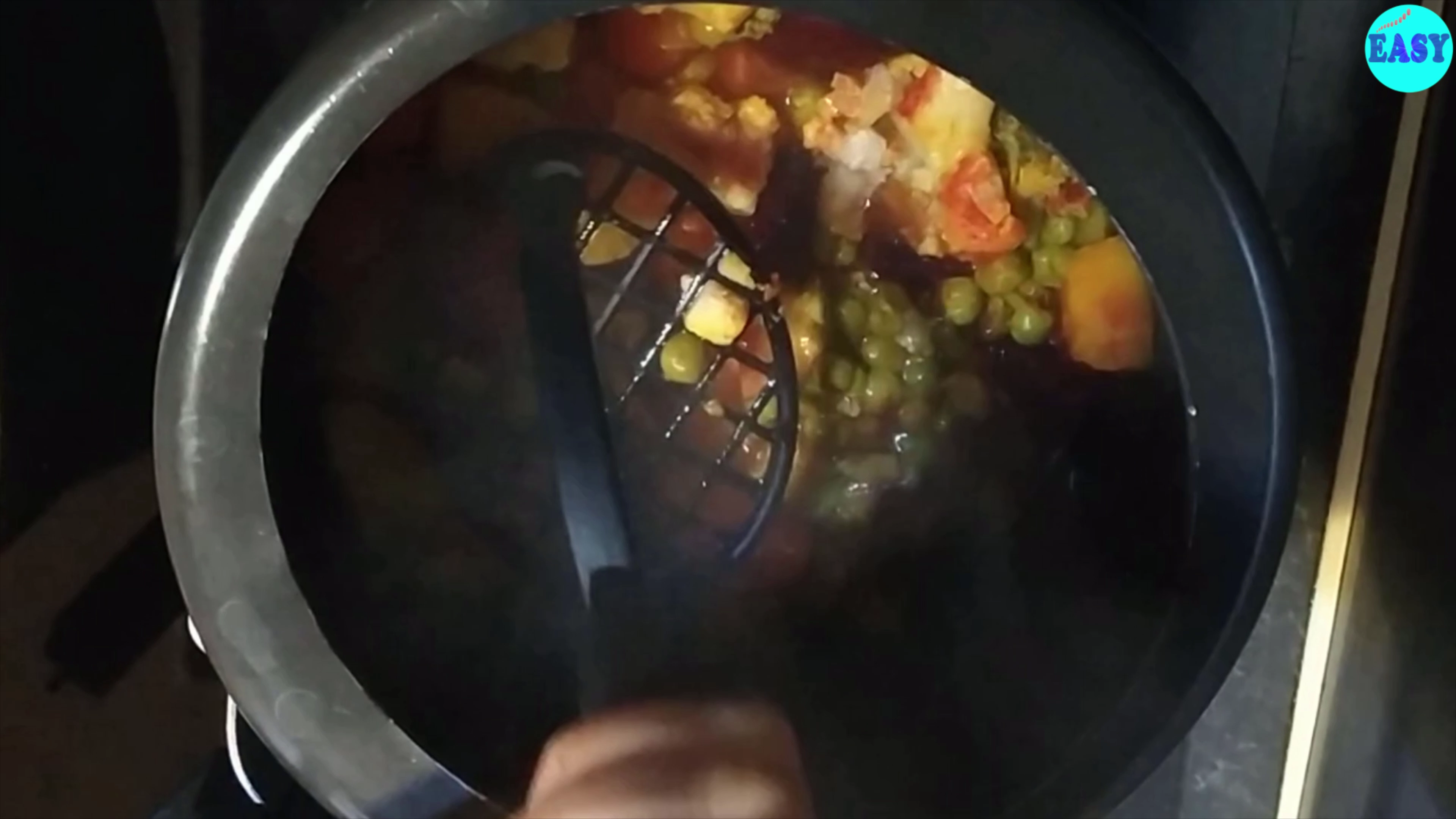 Step 3 - Now open the pressure cooker and mash the vegetables with the help of a masher or ladle.