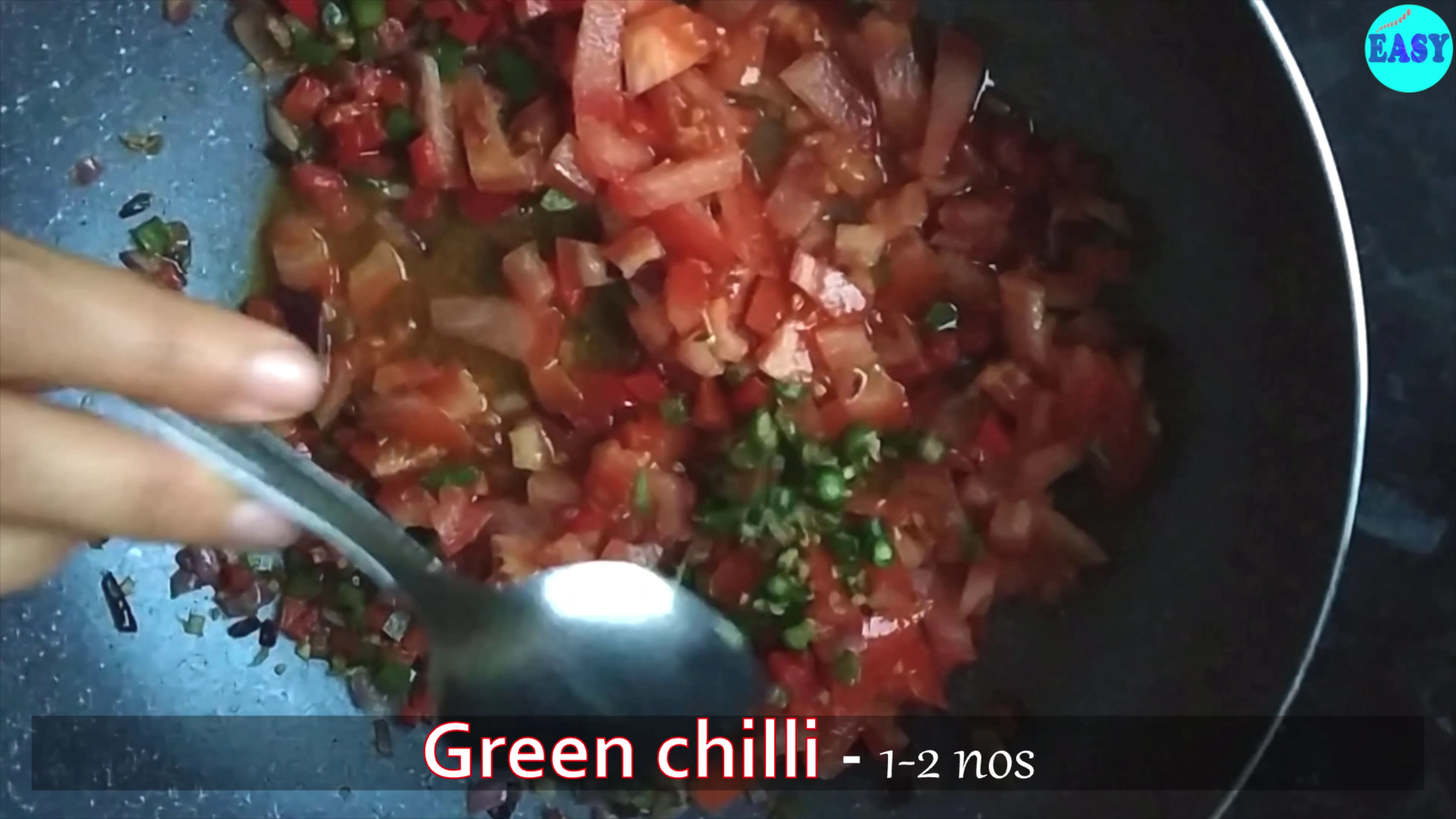 Step 7 - Now add tomatoes, green chillies and salt. Mix it well, cover and cook on medium heat until tomatoes are tender.