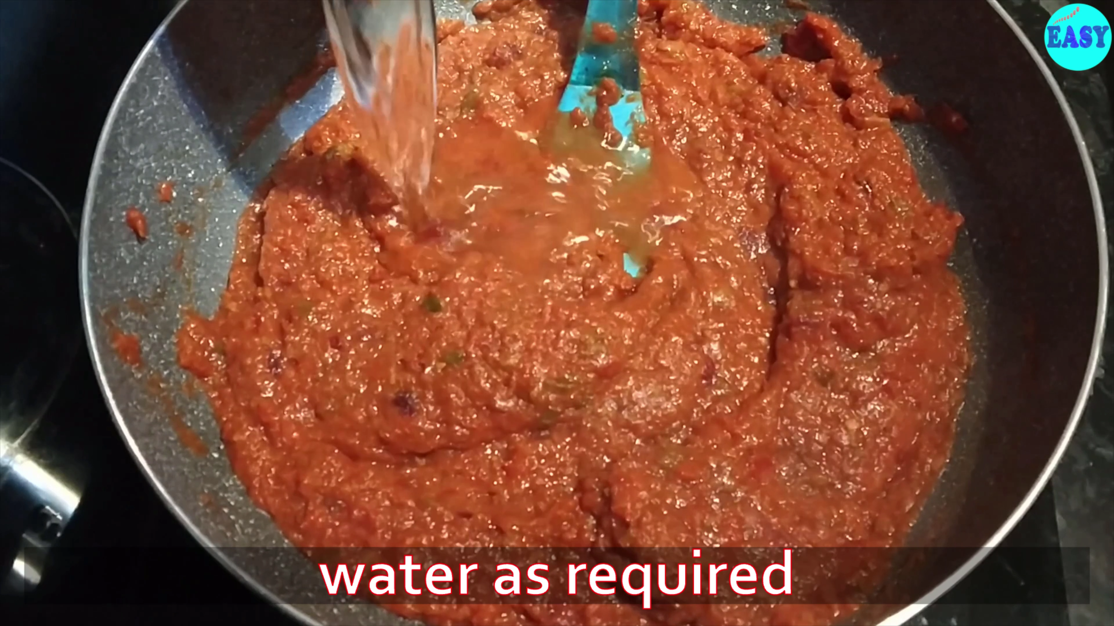 Step 10 - Add water to adjust the consistency of bhaji. Cover and cook on medium heat for another 5 minutes.