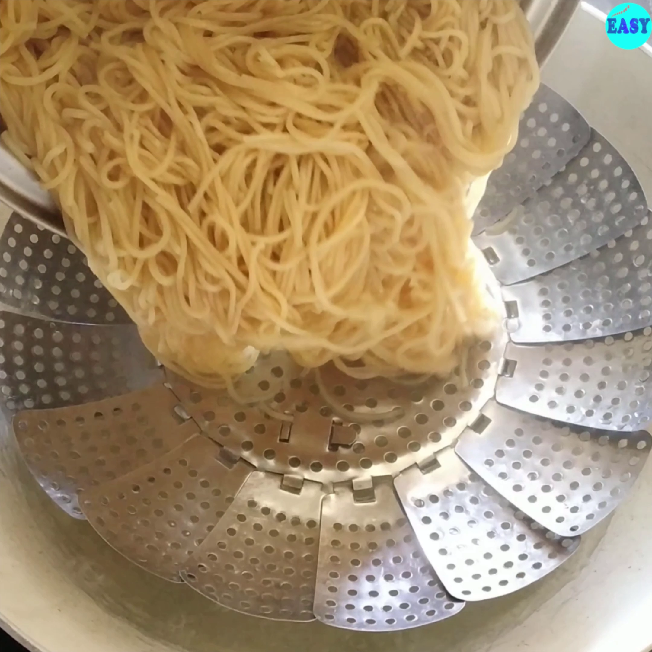 Step 2 - Once cooked remove the noodles in a strainer