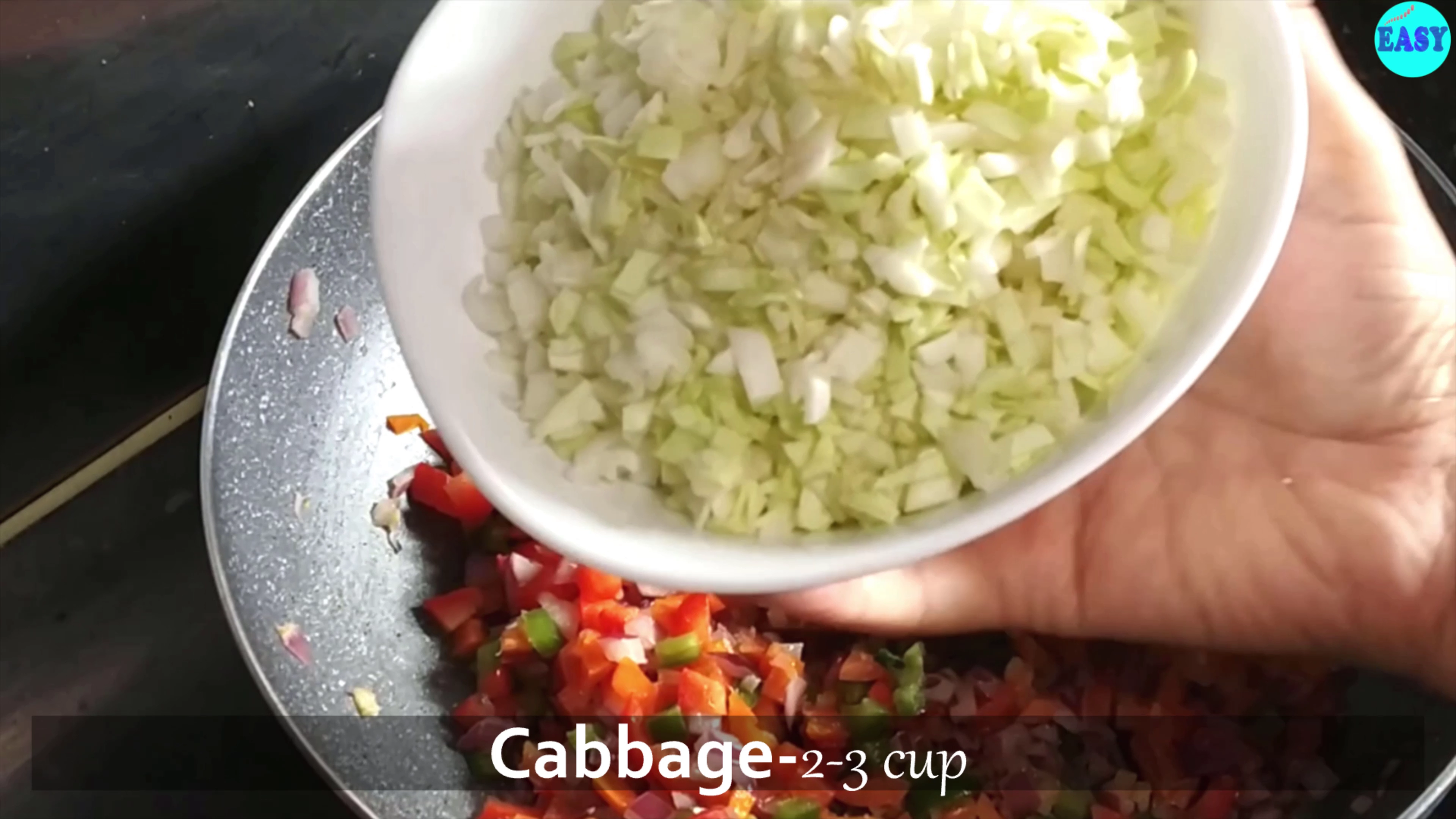 Step 4 - Chopped cabbage and cook it on high flame for 2-3 mins. 