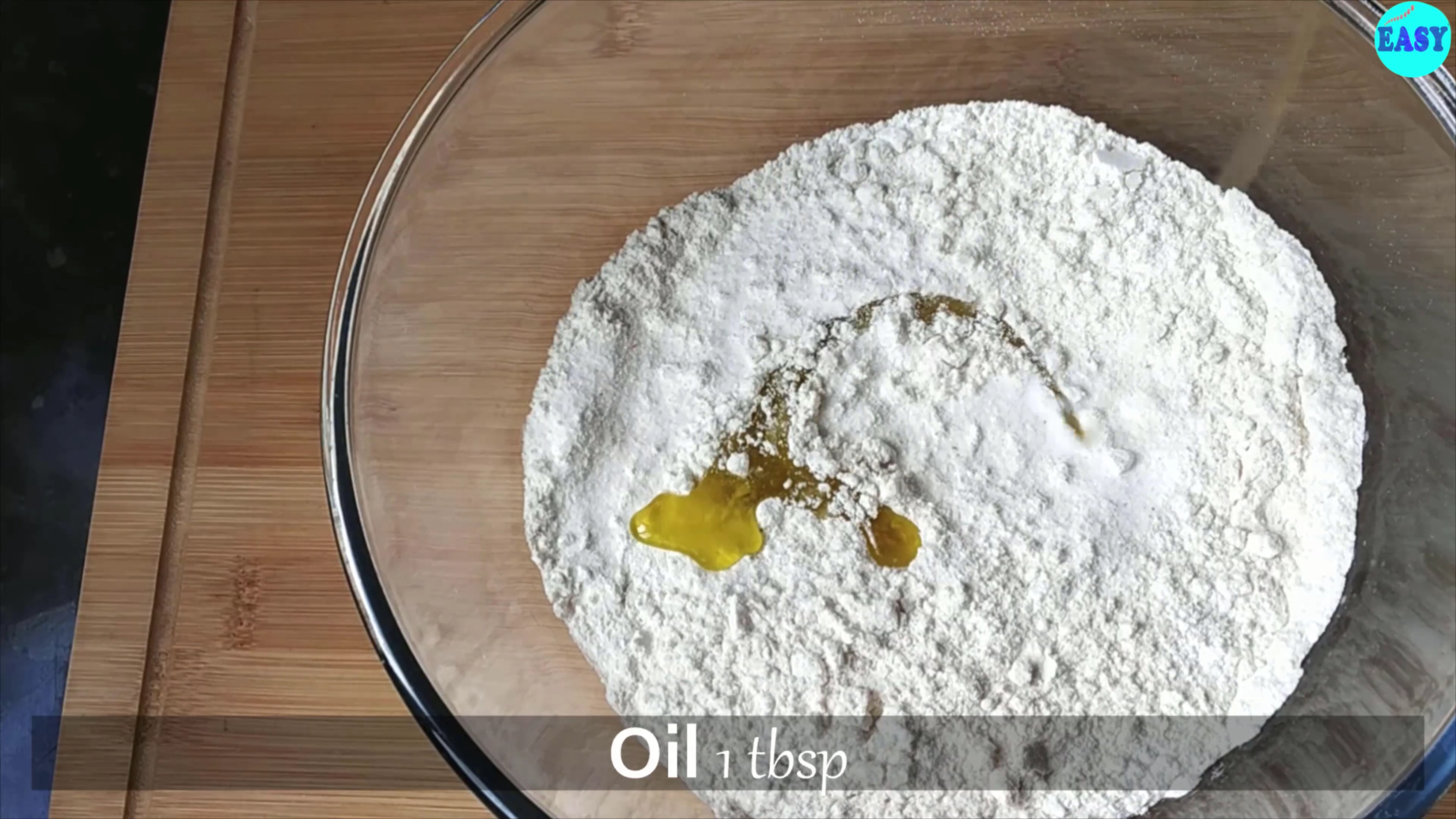 Step 7 - In a big mixing bowl take flour and salt, oil and mix it well and 