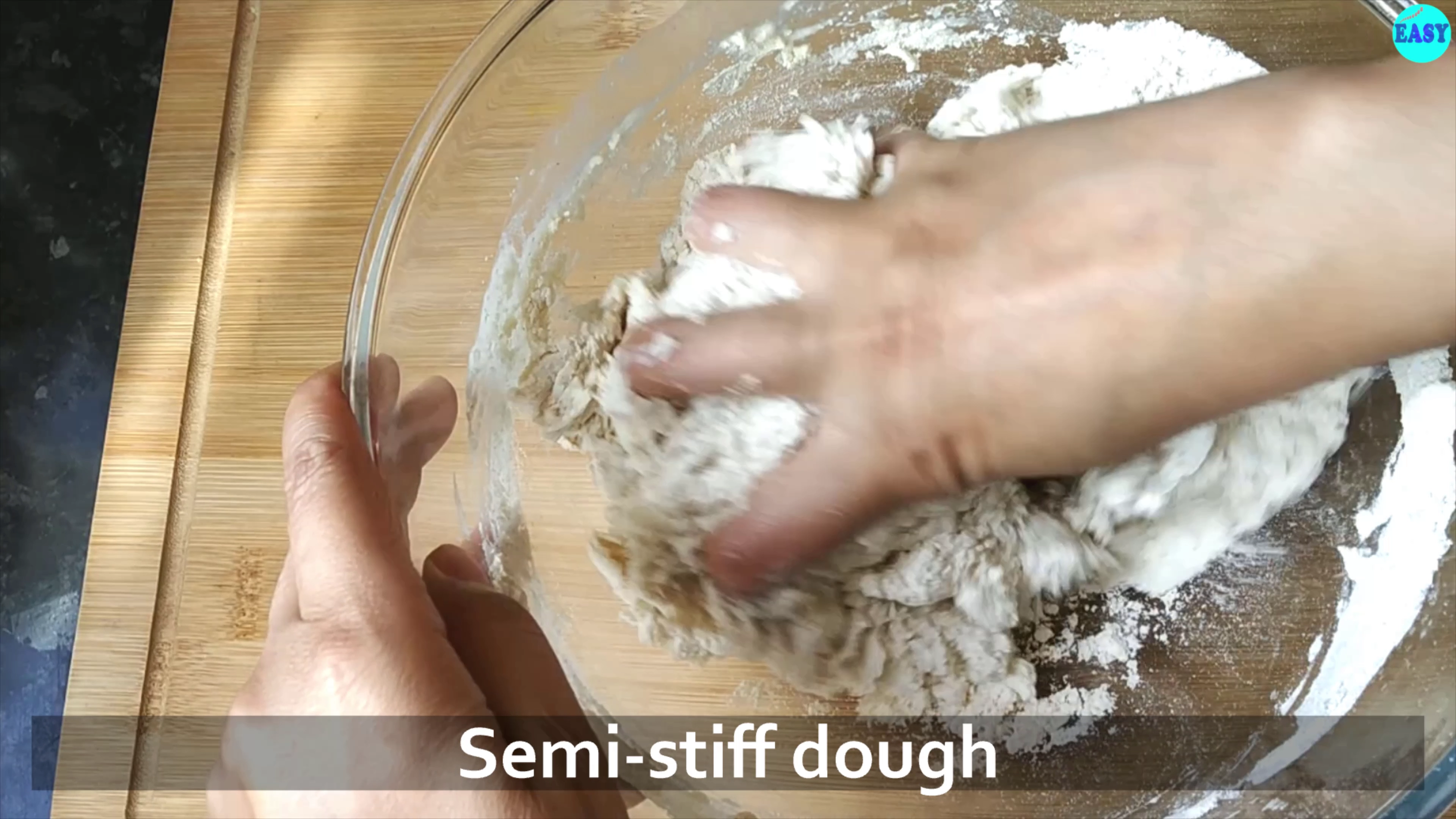 Step 1 - In a big mixing bowl take flour and salt. Mix and add oil. Mix it well and add water to make semi stiff dough