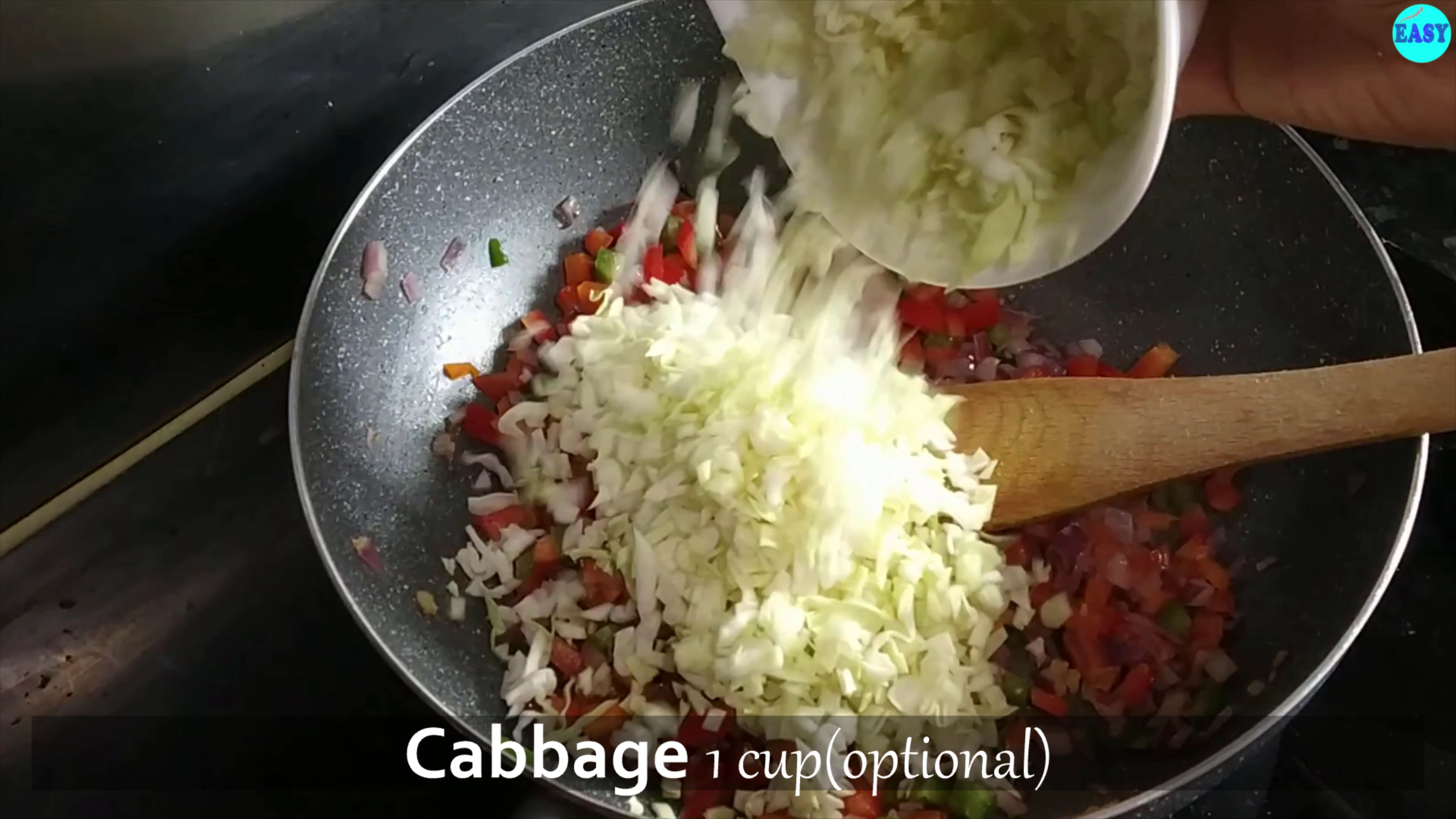 Step 6 - Add chopped cabbage and cook it on high flame for 2-3 minutes. Veggies should be half done not fully cooked.