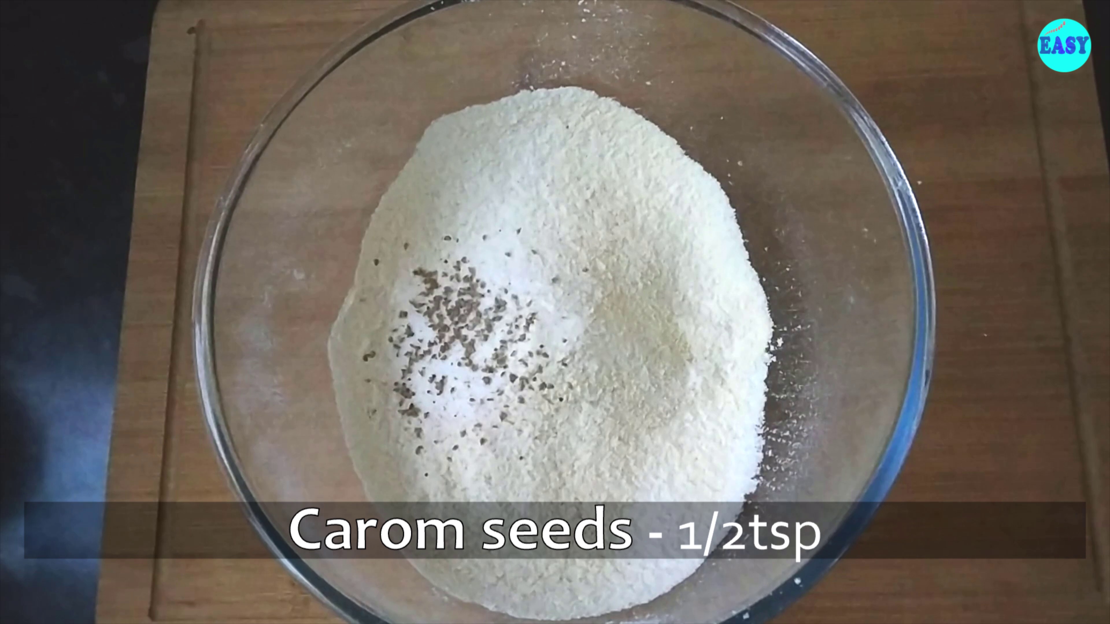 Step 2 - Then add salt and carrom seeds.