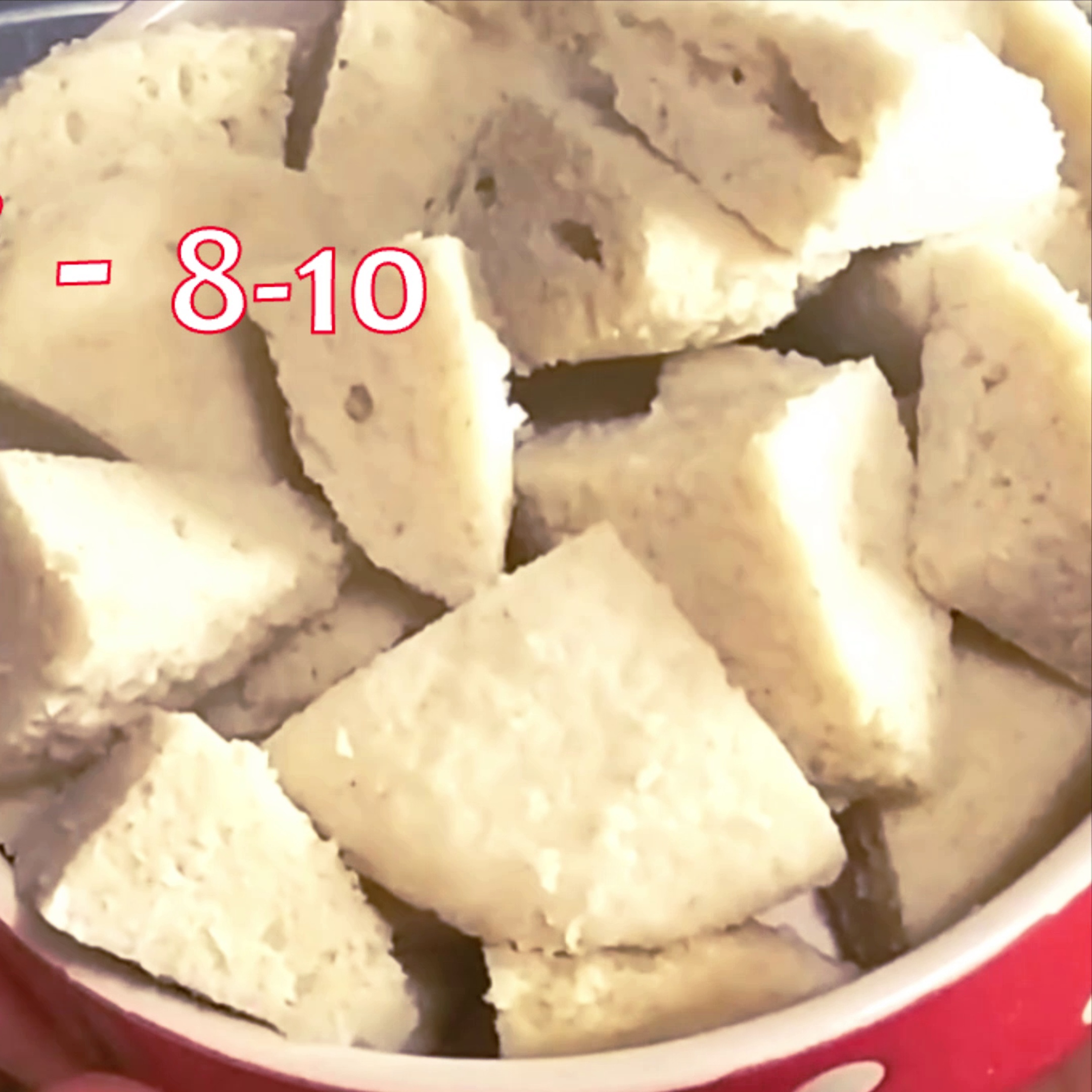 Step 1 - Cut idlis into quarters (4 pieces). I am using leftover idlis for making this recipe, if you are using fresh idlis, then refrigerate it for at least an hour to avoid breaking.