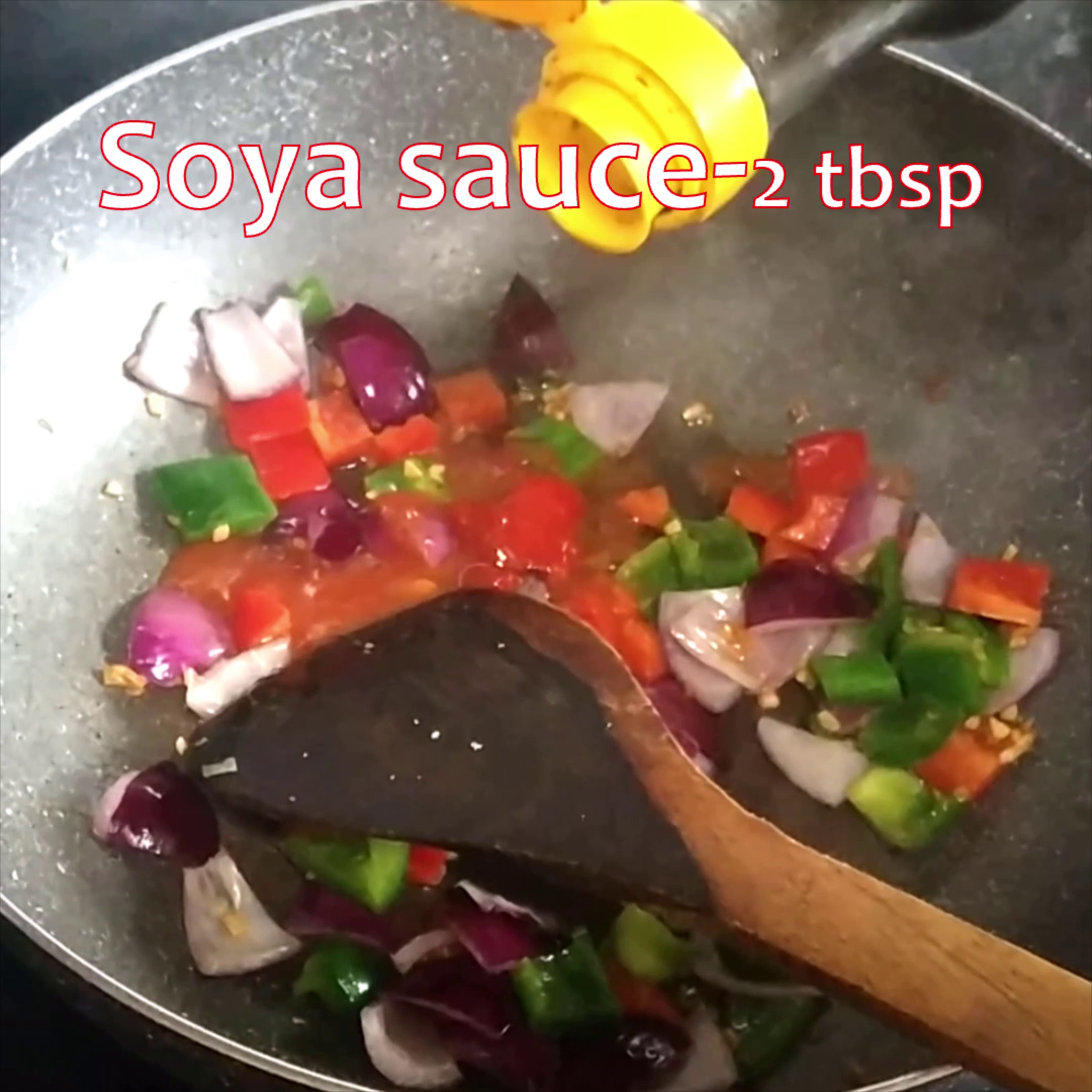 Step 5 - Now add sauces-tomato sauce, red/green chili sauce and soy sauce. Mix everything well and fry for a min.