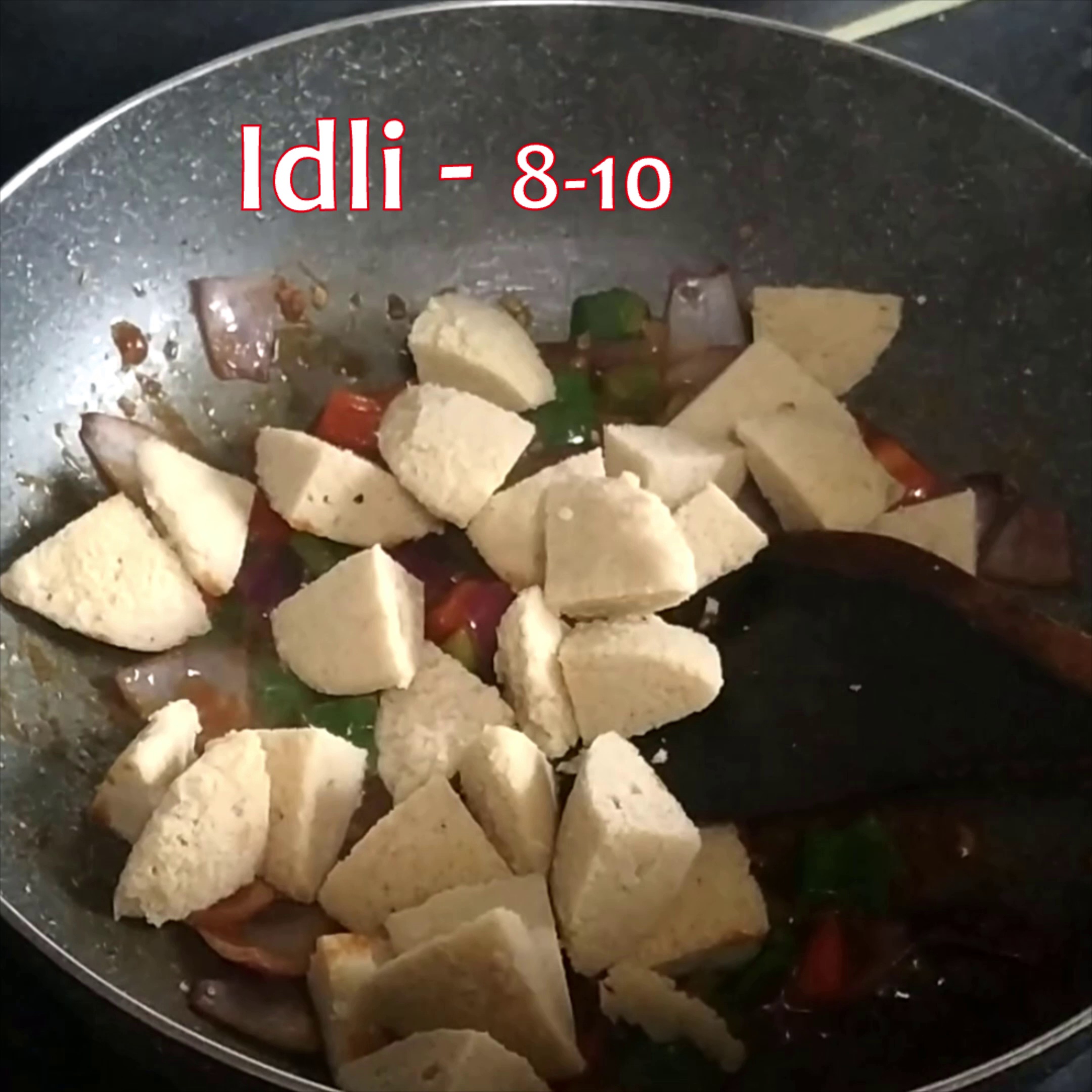 Step 8 - Now add idlis and toss well.