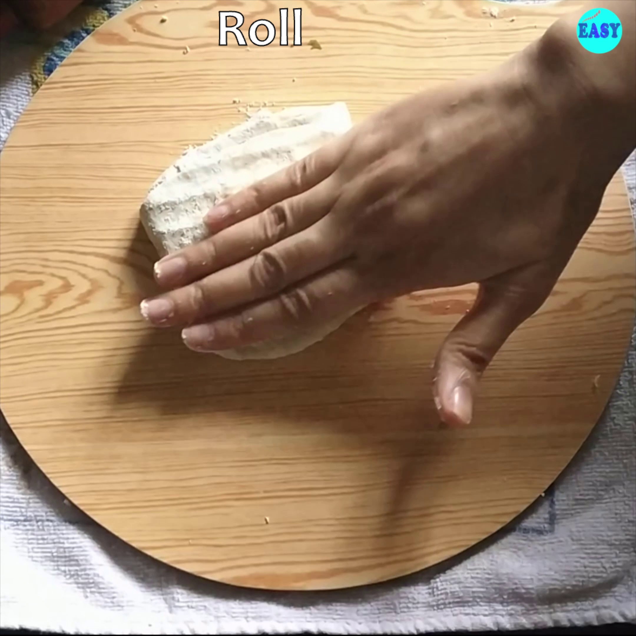 Step 12 - Dust it with flour and press gently with your fingertips.