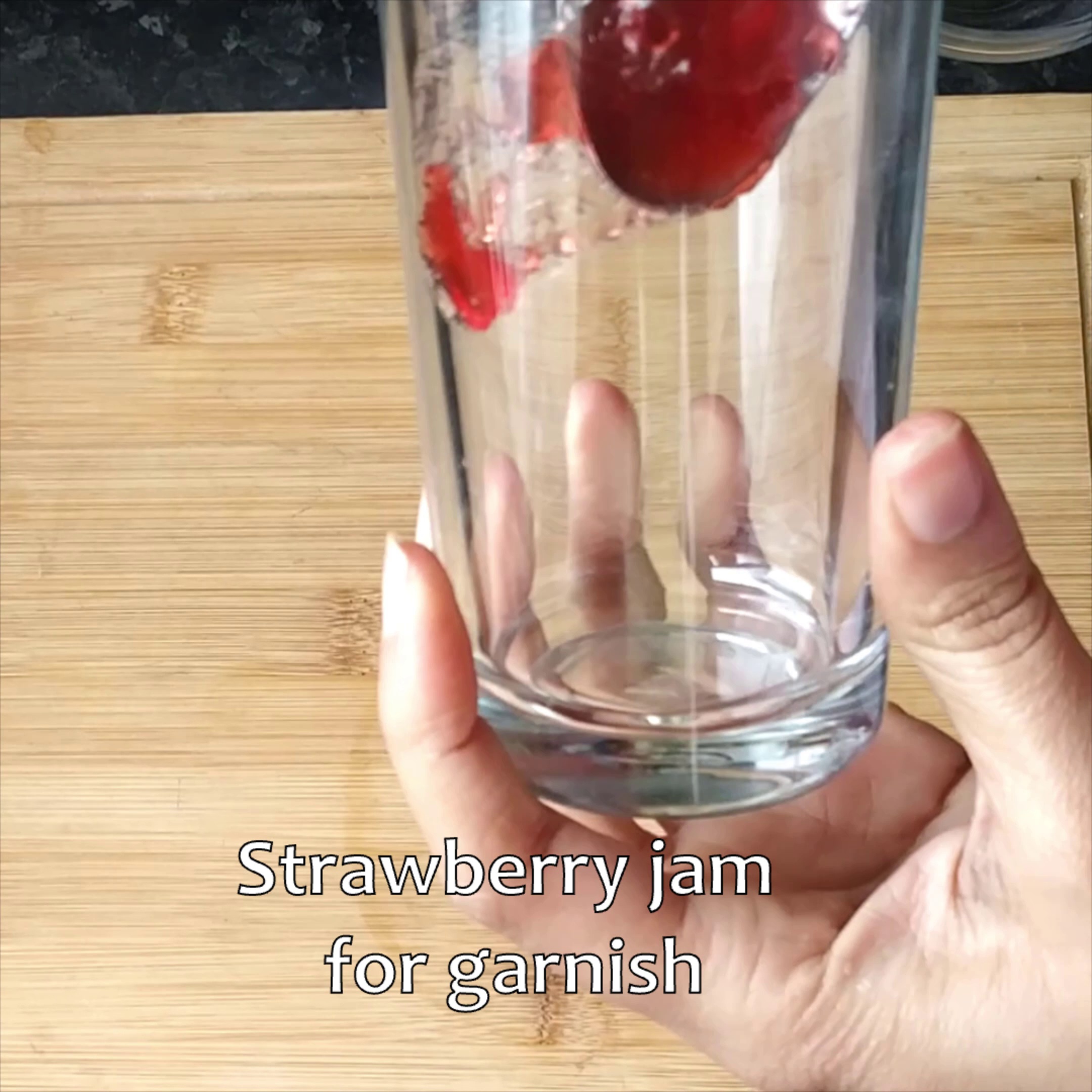 Step 4 - Add some jam on the sides of the glass to make it fancy.