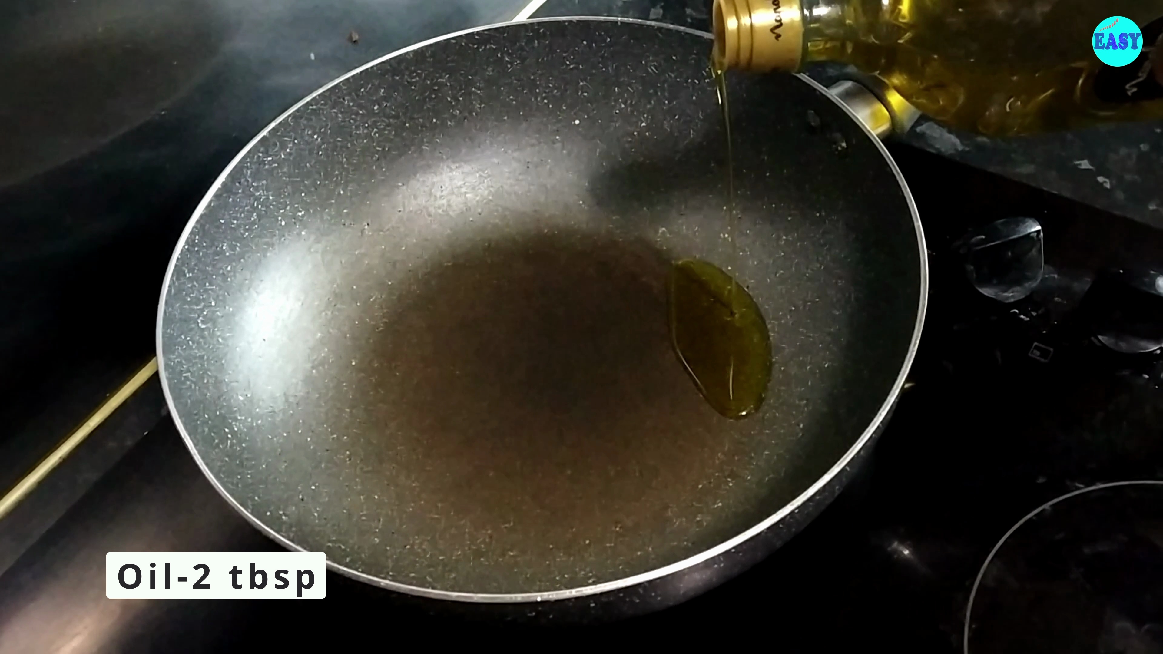 Step 1 - Heat oil in a pan.