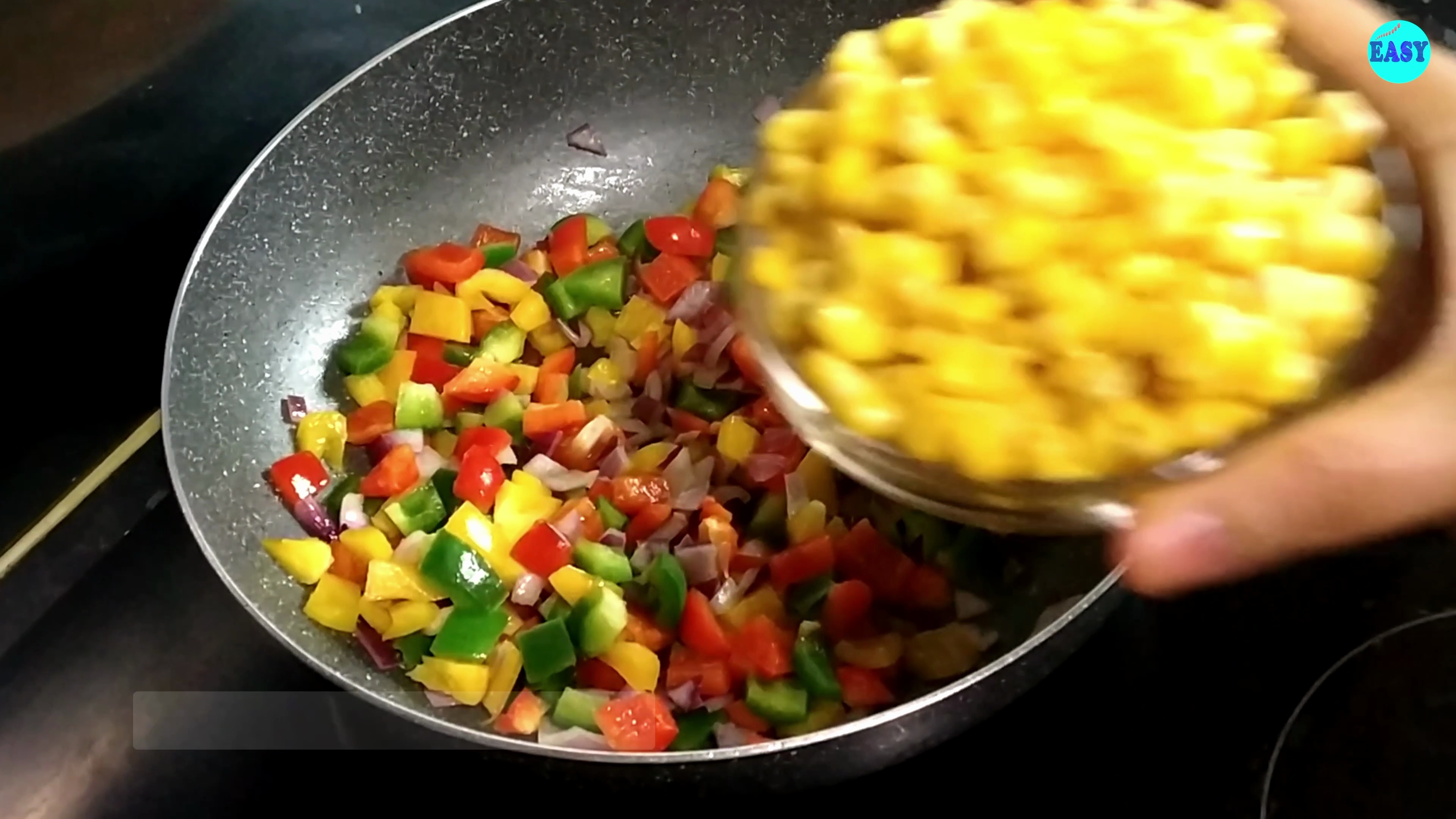 Step 3 - Add the chopped bell peppers and corns and saute for one more minute.