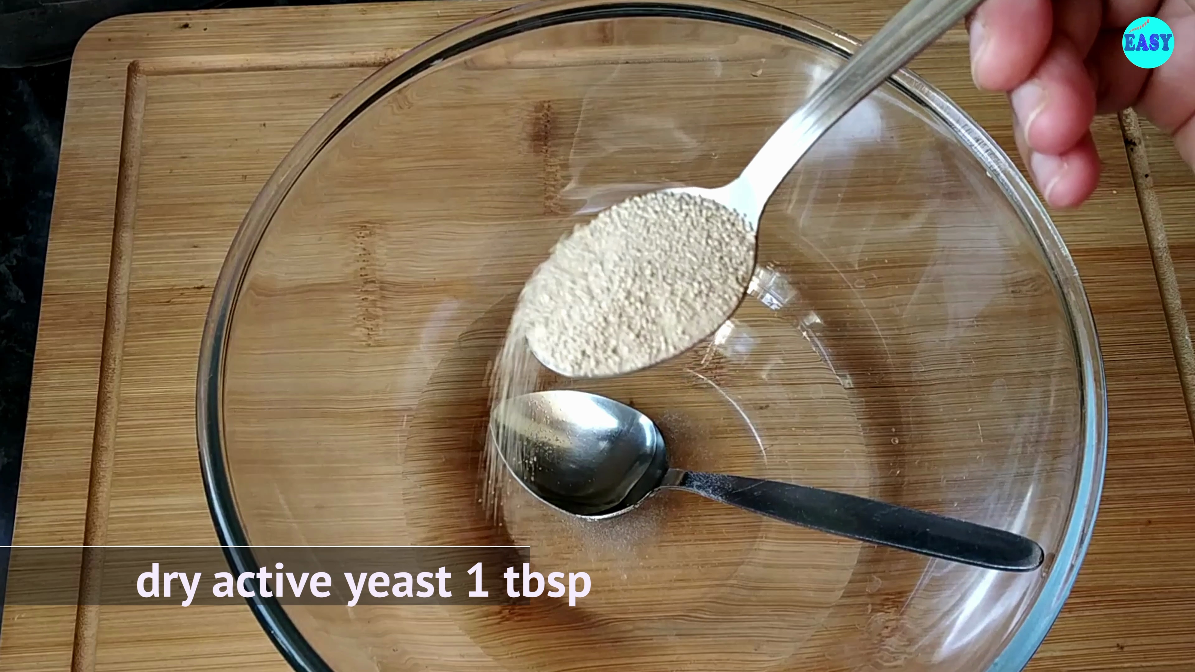 Step 1 - In a large mixing bowl, combine the water, sugar, and yeast. Cover and set aside for 5 minutes.